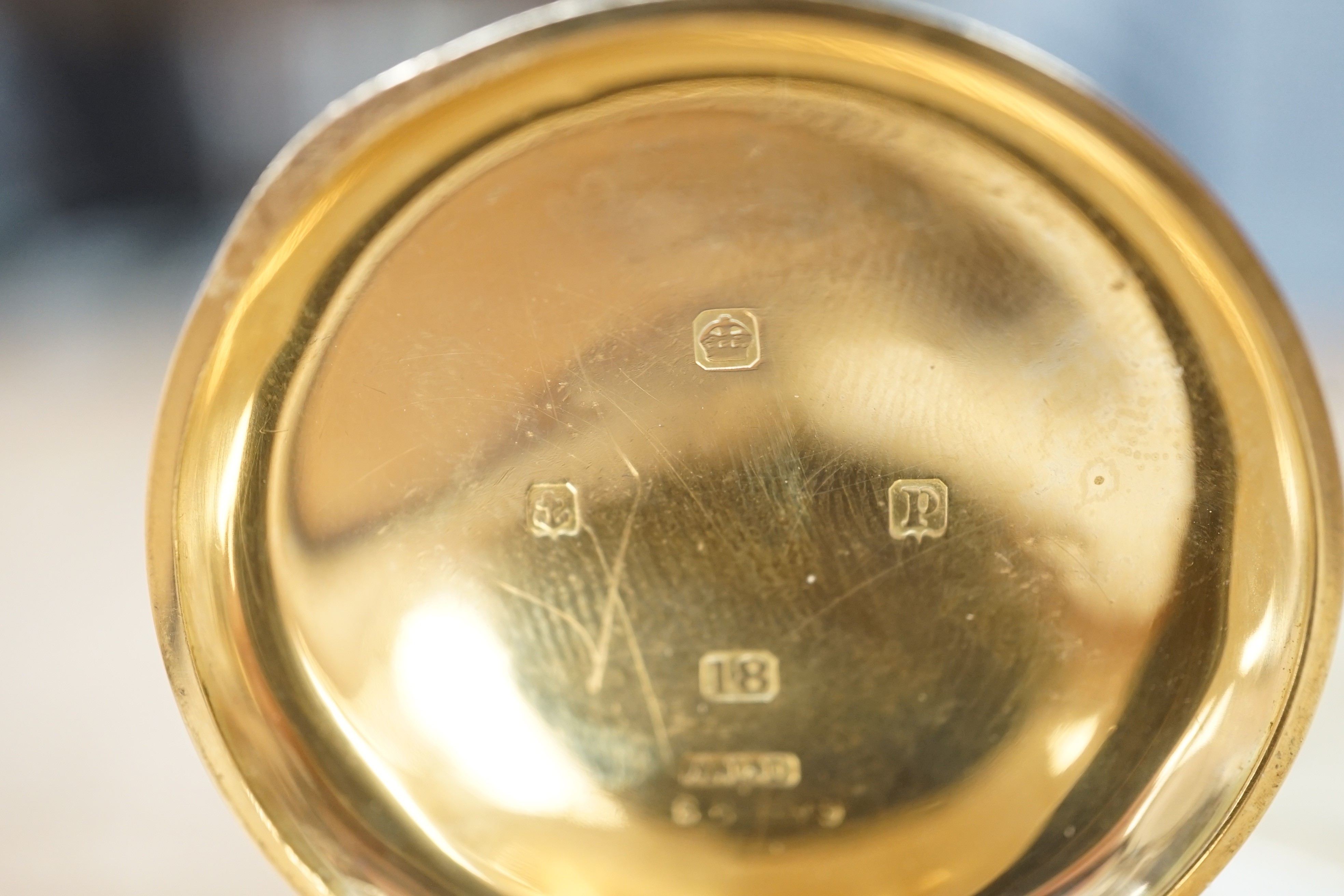 A George V 18ct gold Waltham open faced keyless pocket watch, with Arabic dial and subsidiary seconds, case diameter 50mm, gross weight 98.9 grams.